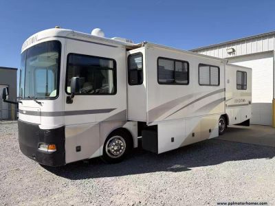 2002 Fleetwood 36T — rear three-quarter view