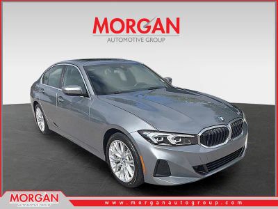 2024 BMW 3 Series 330e in Skyscraper Gray Metallic — front three-quarter view