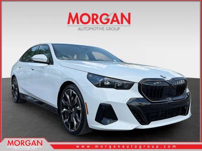 2027 BMW 5 Series 530i in Alpine White — front three-quarter view