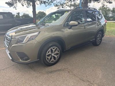 2023 Subaru Forester Premium in Autumn Green Metallic — front three-quarter view