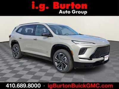 2026 Buick Enclave Sport Touring in Stone Metallic — front three-quarter view