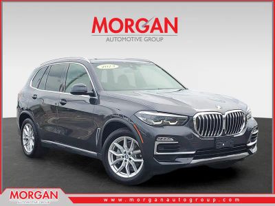 2021 BMW X5 xDrive40i in Dark Graphite Metallic — front three-quarter view