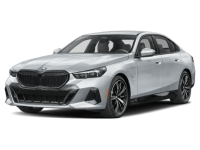 2026 BMW 5 Series 550e xDrive in Gray — front three-quarter view