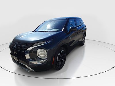 2024 Mitsubishi Outlander Plug-In Hybrid — rear three-quarter view