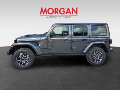 2025 Jeep Wrangler — rear three-quarter view