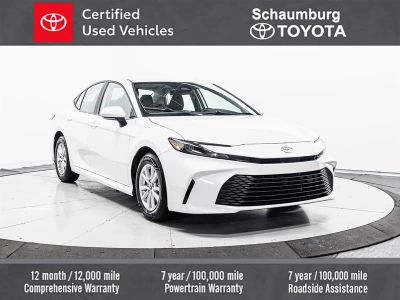 2025 Toyota Camry LE in White — front three-quarter view