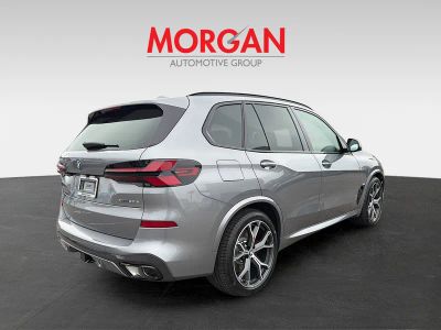 2026 BMW X5 — rear three-quarter view