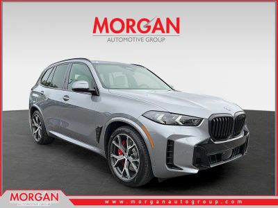 2026 BMW X5 xDrive50e in Skyscraper Grey Metallic — front three-quarter view