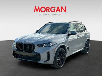 2026 BMW X5 — rear three-quarter view