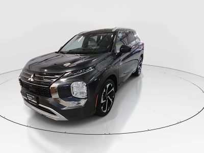 2024 Mitsubishi Outlander Plug-In Hybrid — rear three-quarter view