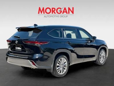 2024 Toyota Highlander — rear three-quarter view