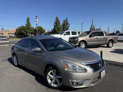 2015 Nissan Altima in Champagne — front three-quarter view