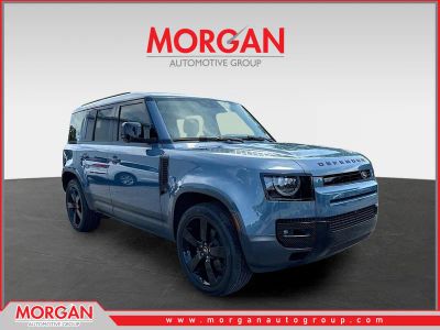 2024 Land Rover Defender S in Tasman Blue Metallic — front three-quarter view