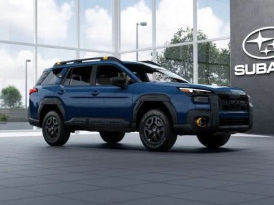 2026 Subaru OUTBACK Wilderness in Geyser Blue — front three-quarter view