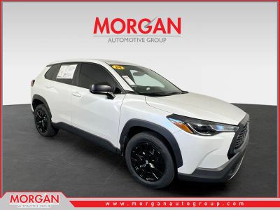 2024 Toyota Corolla Cross L in Wind Chill Pearl — front three-quarter view