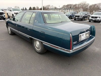 1995 Cadillac Deville — rear three-quarter view
