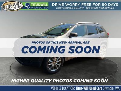 2015 Jeep Cherokee — side profile view