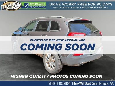 2015 Jeep Cherokee — rear three-quarter view