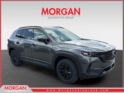 2026 Mazda CX-50 Hybrid Premium in Machine Gray Metallic — front three-quarter view