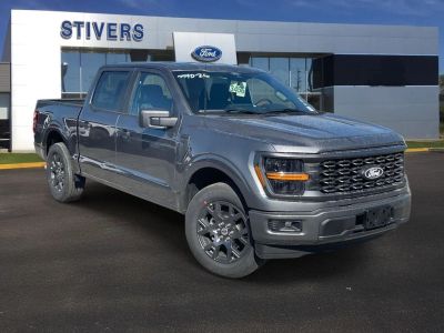 2026 Ford F-150 STX in Carbonized Gray Metallic — front three-quarter view