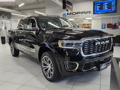 2026 RAM 1500 RAM 1500 TUNGSTEN CREW CAB 4X4 in Diamond Black Crystal Pearl-Coat Exterior Paint — front three-quarter view
