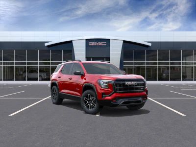 2026 GMC Terrain AT4 in Volcanic Red Tintcoat — front three-quarter view