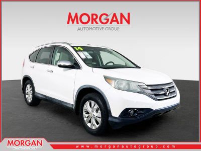 2014 Honda CR-V EX-L in White — front three-quarter view