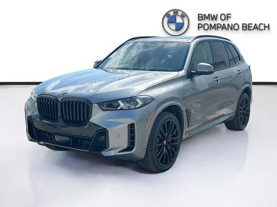 2026 BMW X5 — rear three-quarter view