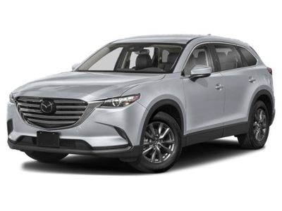 2022 Mazda CX-9 Touring in Soul Red Crystal Metallic — front three-quarter view