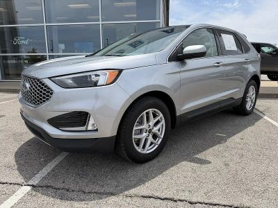 2023 Ford Edge SEL in Iconic Silver — front three-quarter view