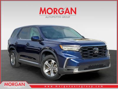 2024 Honda Pilot EX-L 7 Passenger in Obsidian Blue Pearl — front three-quarter view