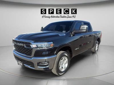 2025 RAM 1500 Big Horn in Diamond Black Crystal Pearlcoat — front three-quarter view