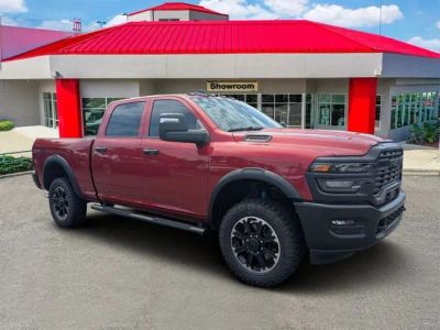 2026 RAM 2500 Tradesman in Molten Red Pearl-Coat Exterior Paint — front three-quarter view