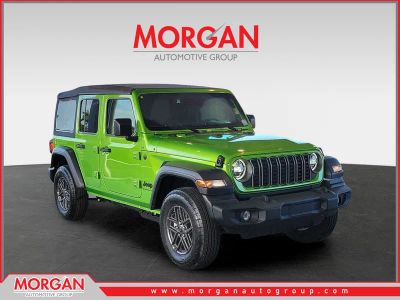 2026 Jeep Wrangler Sport S in Mojito Clearcoat — front three-quarter view