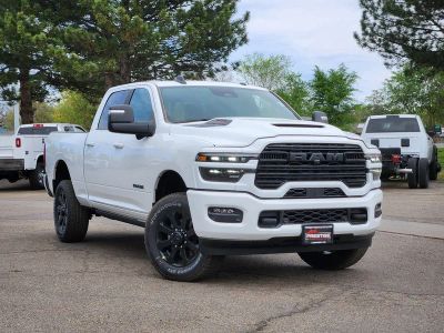2026 RAM 2500 RAM 2500 LARAMIE CREW CAB 4X4 6'4' BOX in Bright White Clear-Coat Exterior Paint — front three-quarter view