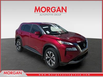 2023 Nissan Rogue SV in Red — front three-quarter view