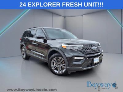 2024 Ford Explorer XLT in Black Metallic — front three-quarter view