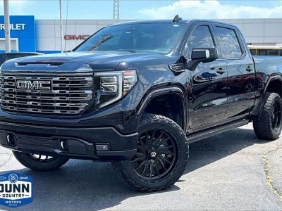 2024 GMC Sierra 1500 Denali Ultimate in Onyx Black — front three-quarter view