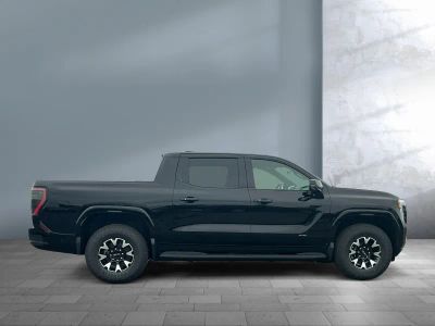 2026 GMC Sierra EV — rear three-quarter view