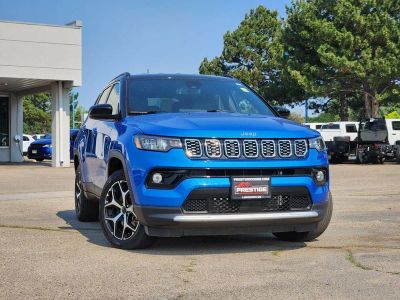 2025 Jeep Compass Limited 4x4 in Hydro Blue Pearlcoat — front three-quarter view