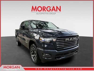 2026 Ram 1500 Laramie in Forged Blue Metallic — front three-quarter view