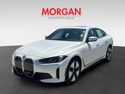 2026 BMW i4 — rear three-quarter view