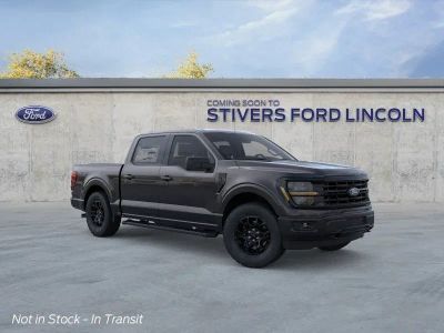 2026 Ford F-150 XLT in Agate Black Metallic — front three-quarter view