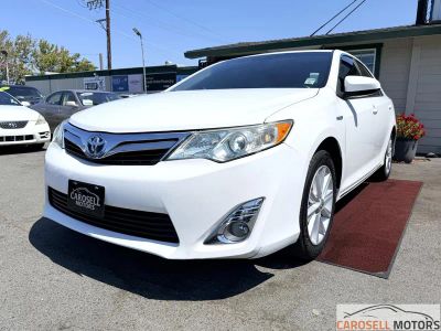 2014 Toyota Camry Hybrid — side profile view