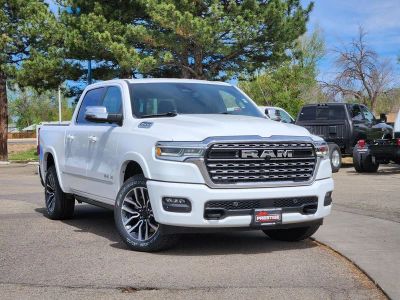 2026 RAM 1500 RAM 1500 LIMITED CREW CAB 4X4 5'7' BOX in Bright White Clear-Coat Exterior Paint — front three-quarter view
