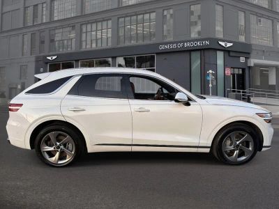 2026 Genesis GV70 — rear three-quarter view