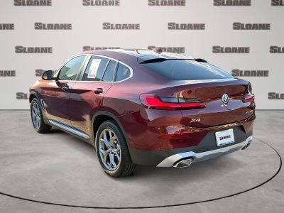 2025 BMW X4 — rear three-quarter view