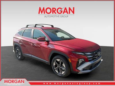 2026 Hyundai TUCSON SEL in Ultimate Red — front three-quarter view