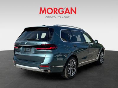 2026 BMW X7 — rear three-quarter view
