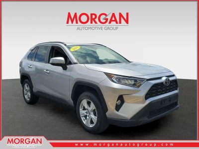 2019 Toyota RAV4 XLE in Lunar Rock — front three-quarter view